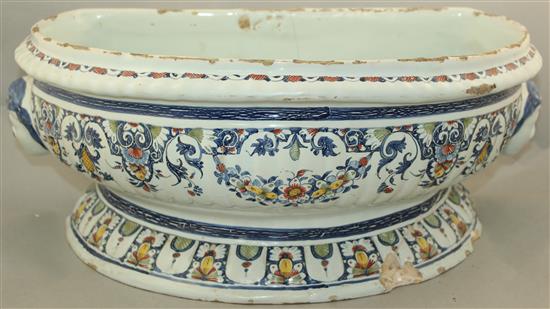 A Rouen faience pottery cistern, c.1720-1740, 53cm, restored